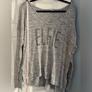 Long sleeves shirt that says “ELFIE”